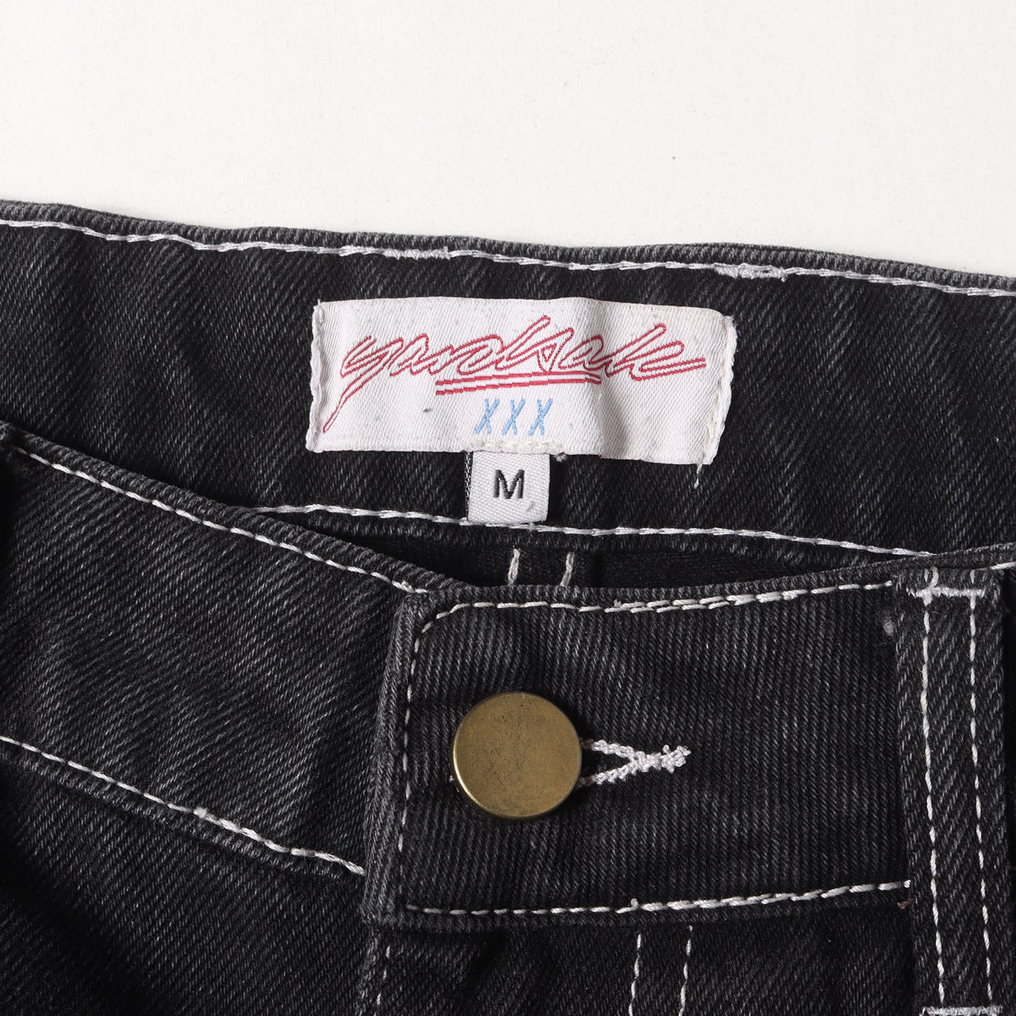 ロゴ刺繍 ウォッシュド デニムパンツ