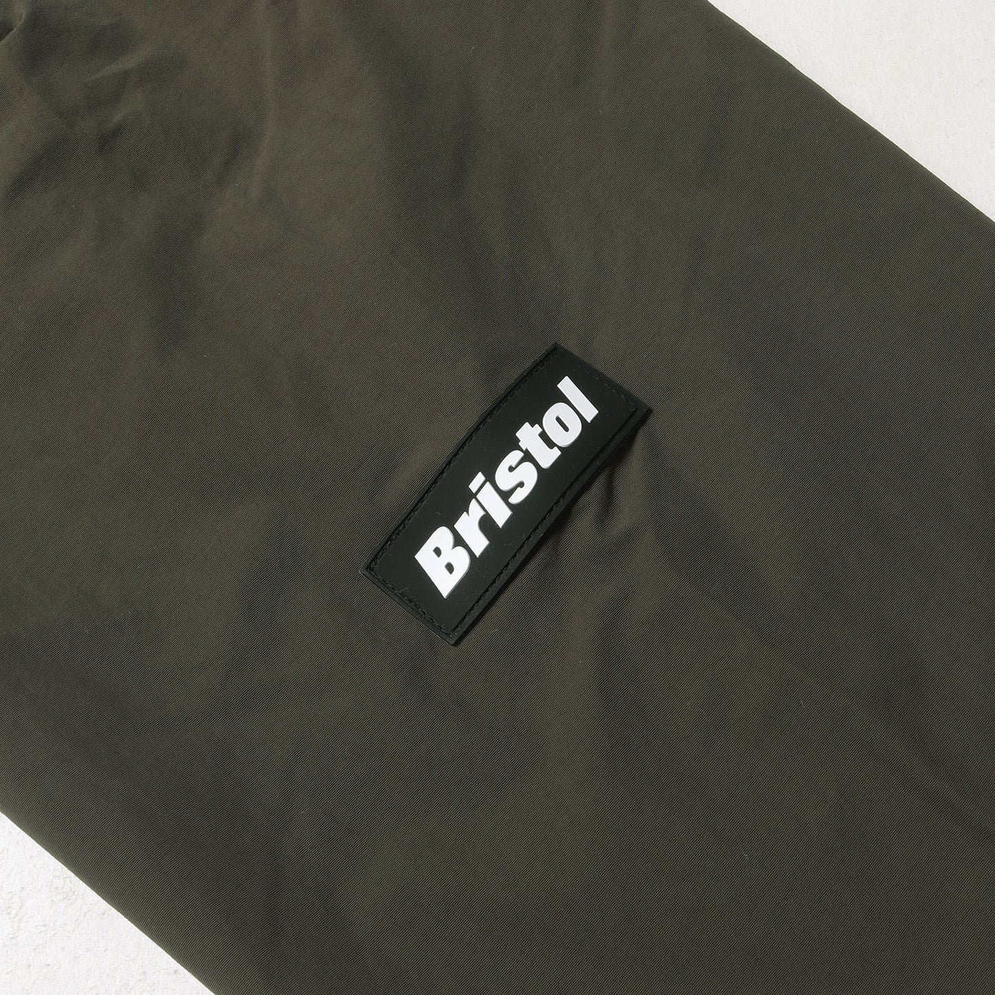 24AW アップリケロゴ ナイロン フード ジャケット(NYLON HOODED JACKET)