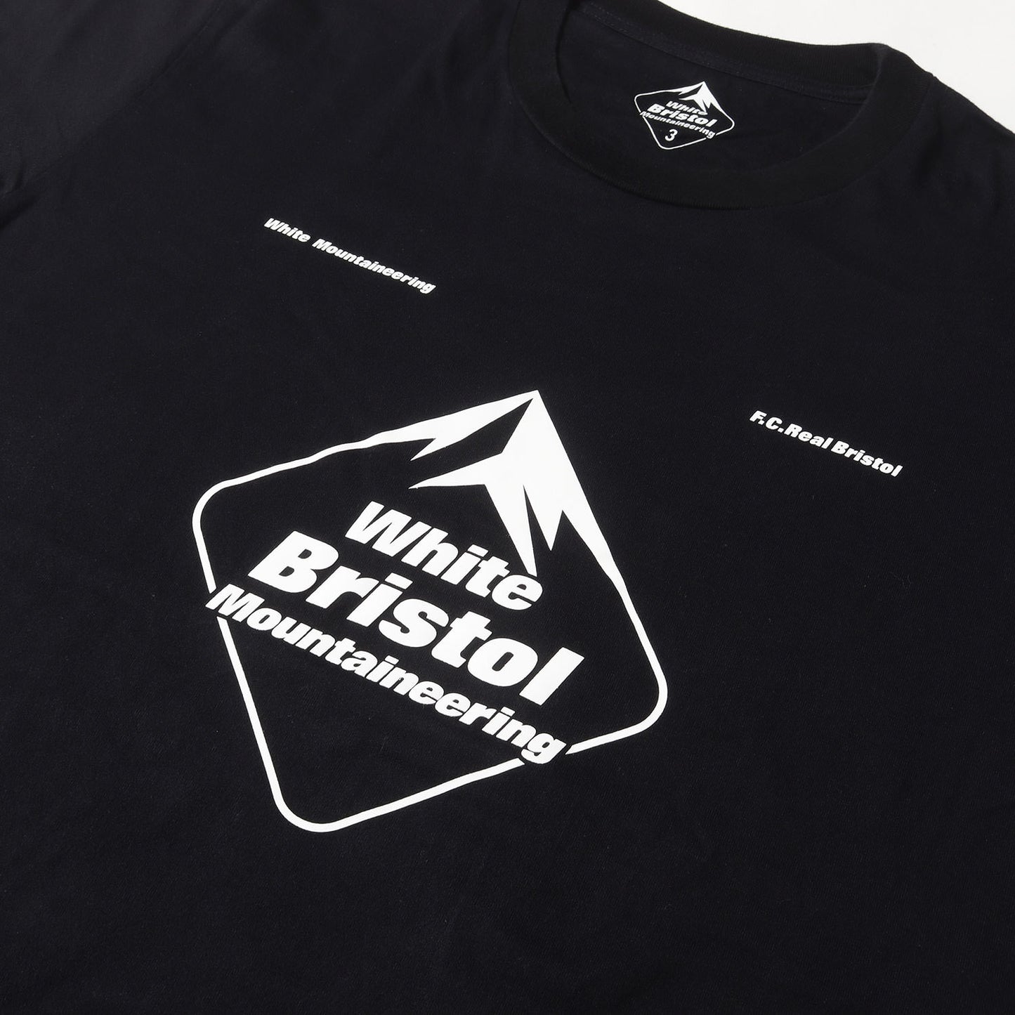 22AW ×F.C.Real Bristol エンブレムロゴ Tシャツ(EMBLEM TEE)