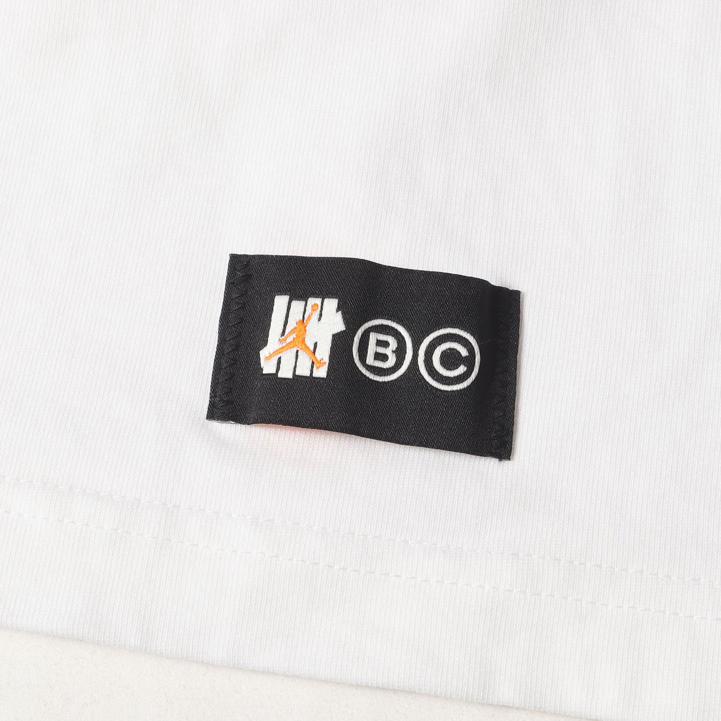 22AW ×UNDEFEATED JORDAN カモフラージュロゴ Tシャツ