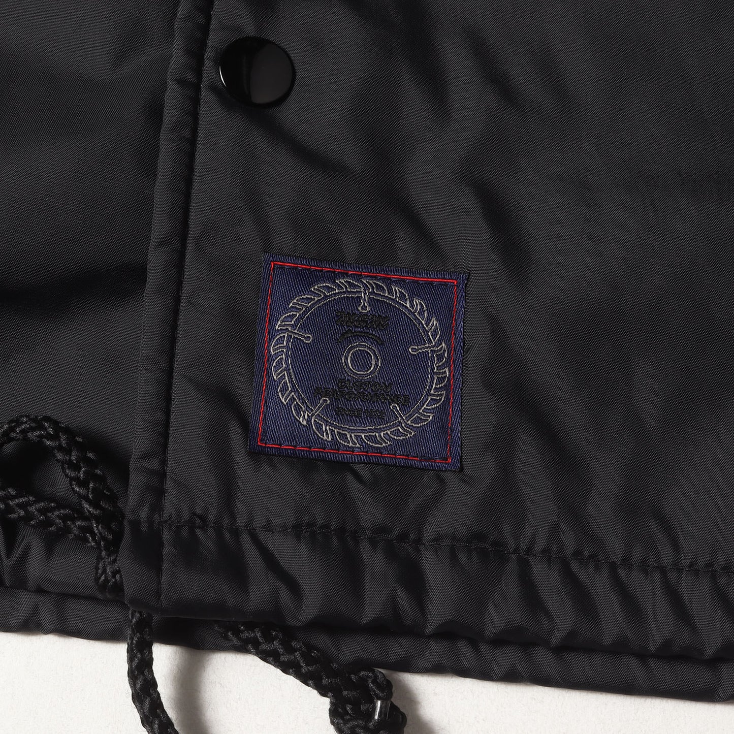 ×ANRIVALED by UNRIVALED スターパッチ ウィンドブレイカー / コーチジャケット(WINDBREAKER)