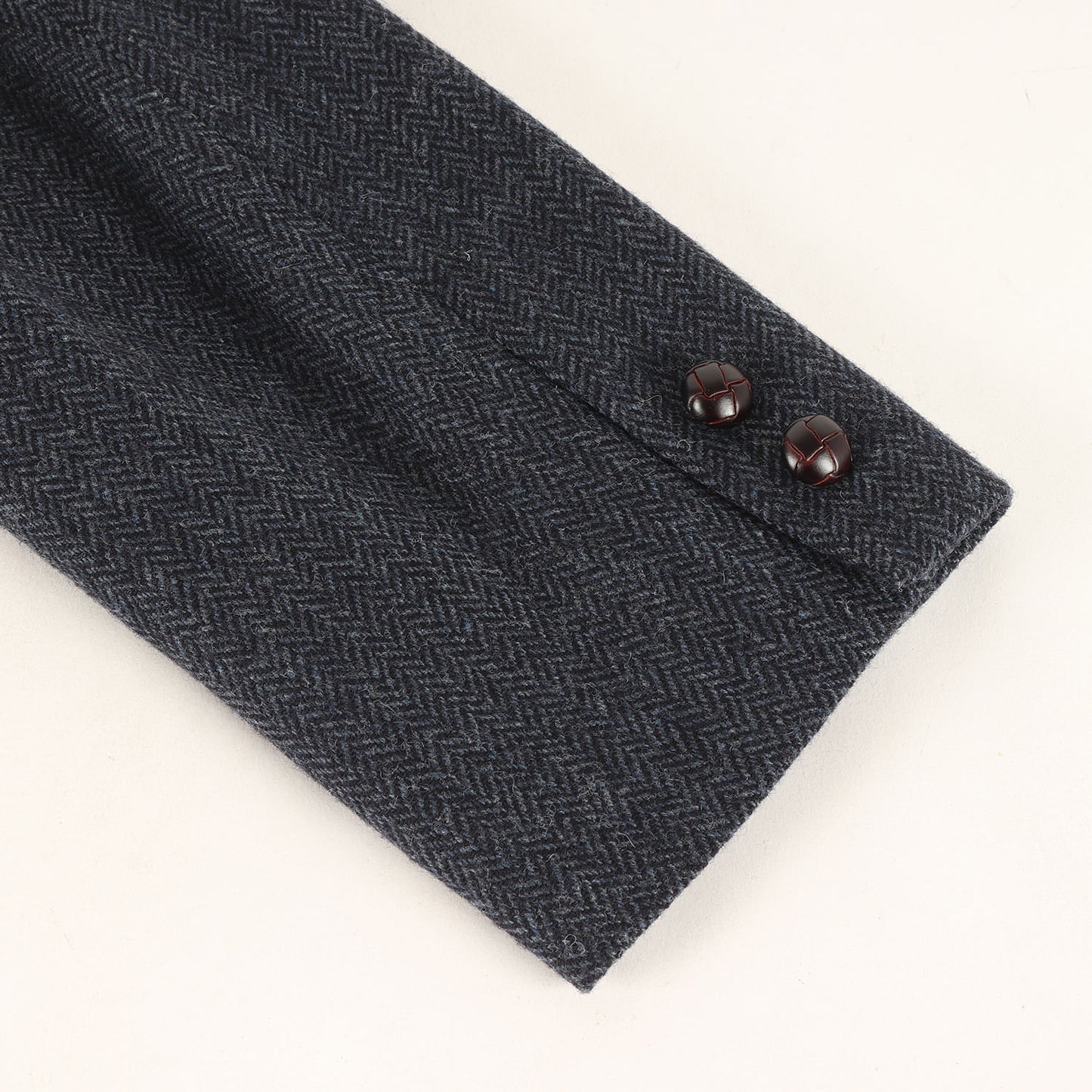 ヘリンボーンウール くるみボタン テーラードジャケット