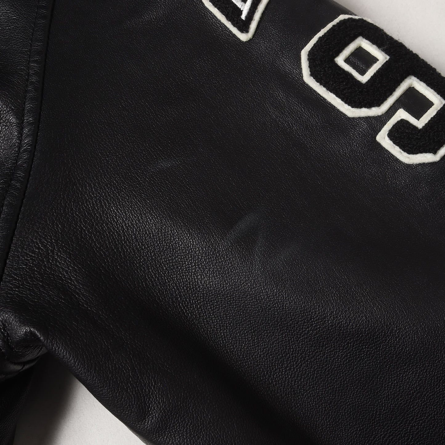 オールシープスキンレザー スタジャン(LEATHER STADIUM JACKET)