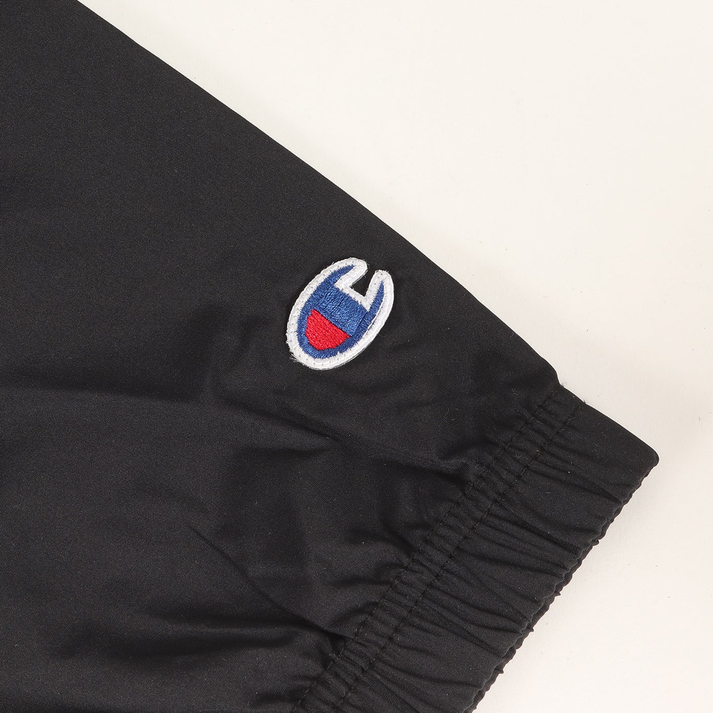 ×Champion グラフィックプリント コーチジャケット