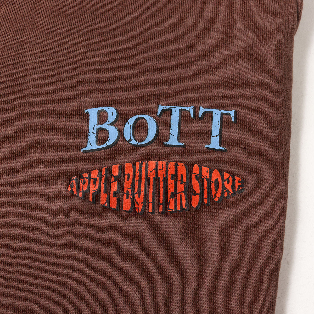 ×APPLE BUTTER STORE ロゴプリント スウェットパンツ