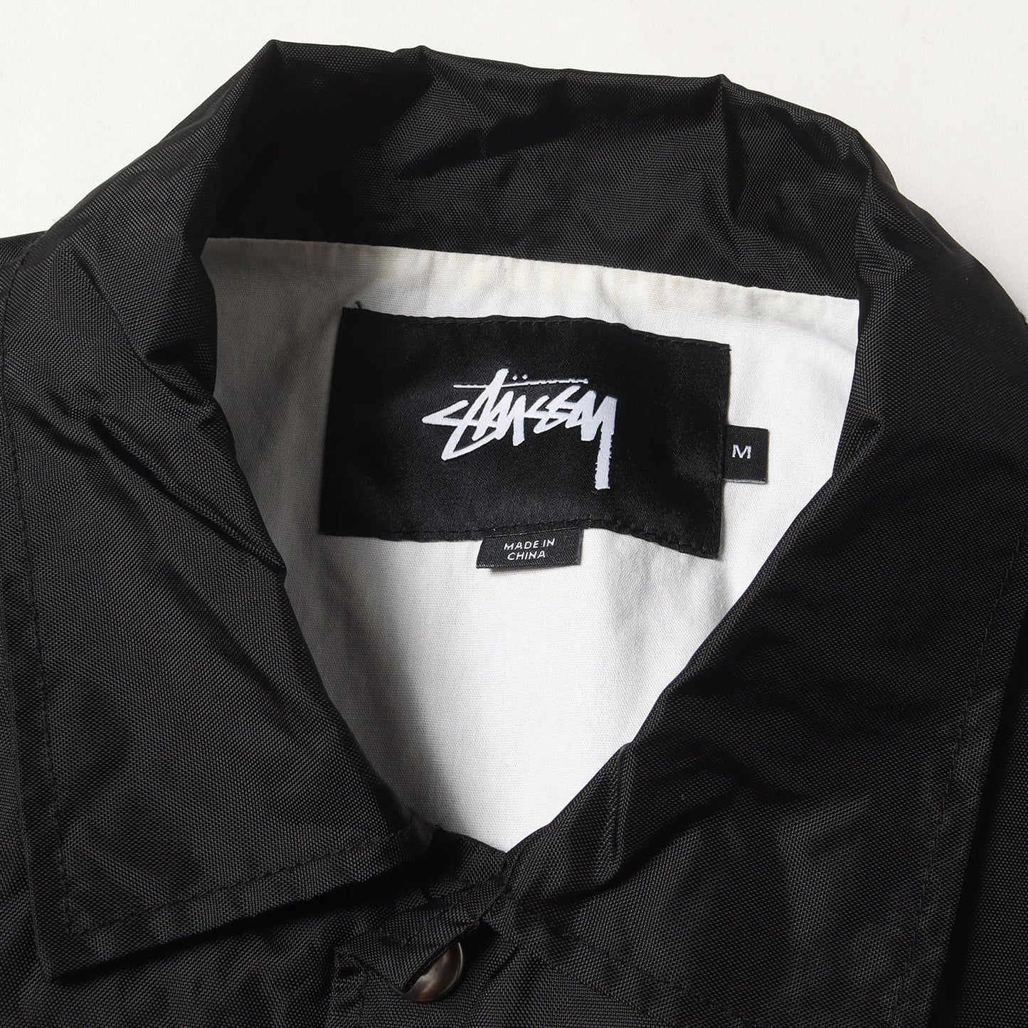 ストックロゴ ナイロン コーチジャケット