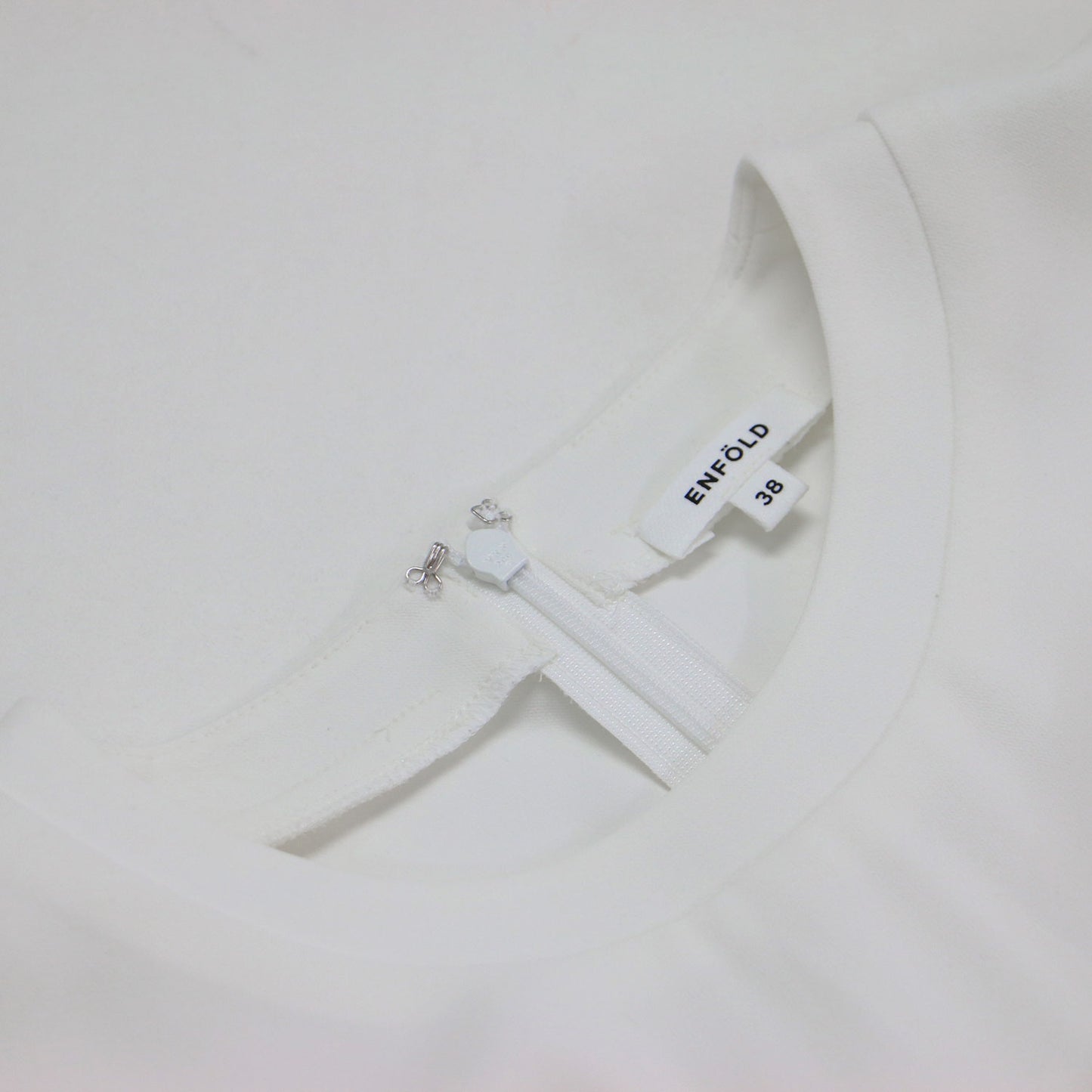 プルオーバー トップス / チュニック クルーネック 長袖 ドロップショルダー バックファスナー ヘムライン サイドスリット ウォッシャブル
