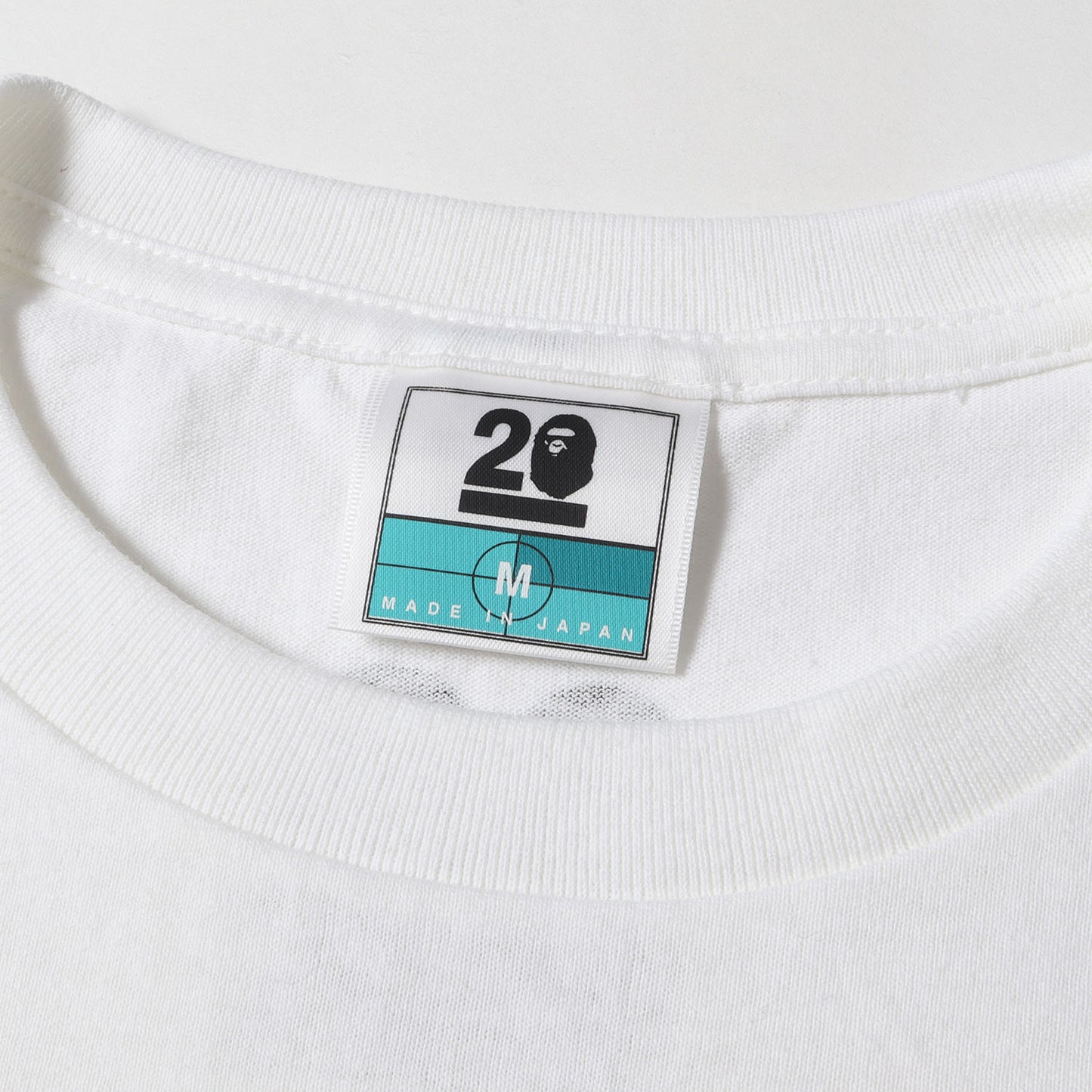 NOWHERE 20周年記念 ×mastermind JAPAN 猿迷彩 ナンバリングロゴ Tシャツ