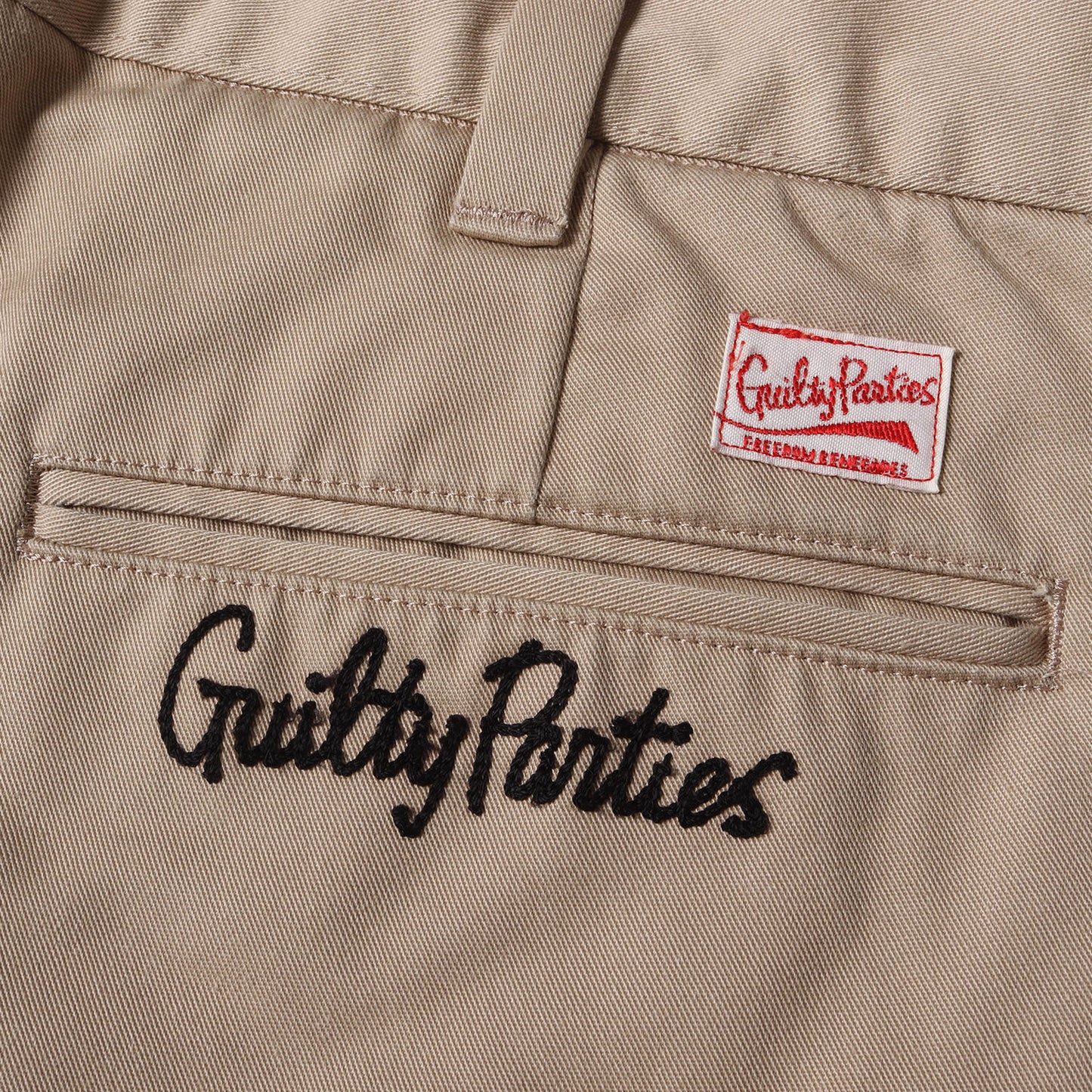 チェーン刺繍ロゴ T/Cツイル ブーツカット チノパンツ