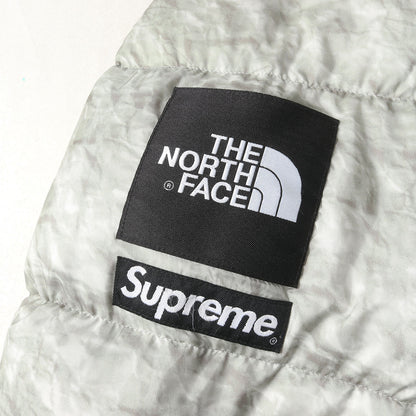 ×THE NORTH FACE ペーパープリント ヌプシ ダウンジャケット(Paper Print Nuptse Jacket)
