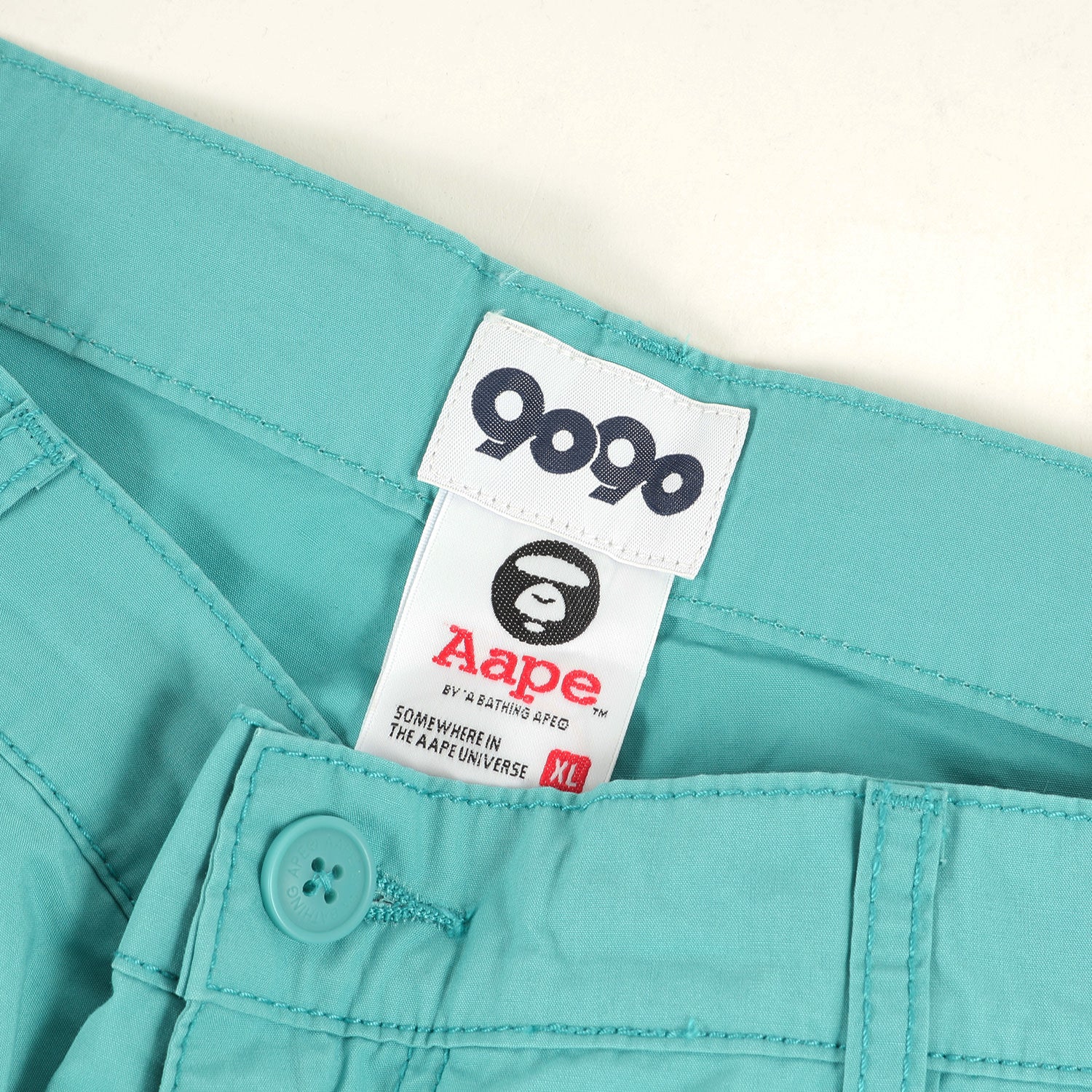 9090 (ナインティーナインティー) 22AW ×AAPE by A BATHING APE コットン バギー パンツ(WOVEN PANTS) –  ブランド古着の通販・買取 | BEEGLE by Boo-Bee