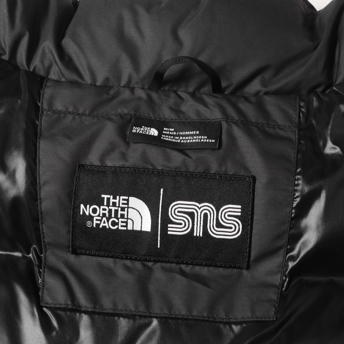 ×SNS Sneakersnstuff タイダイ柄 ヌプシ ダウンジャケット(NUPTSE JACKET)