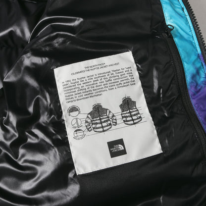 ×SNS Sneakersnstuff タイダイ柄 ヌプシ ダウンジャケット(NUPTSE JACKET)