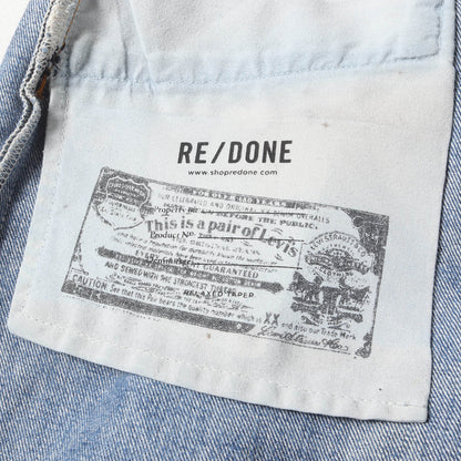 ×Levi's 古着リメイク スリム テーパード デニムパンツ