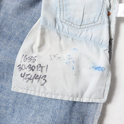 ×Levi's 古着リメイク スリム テーパード デニムパンツ