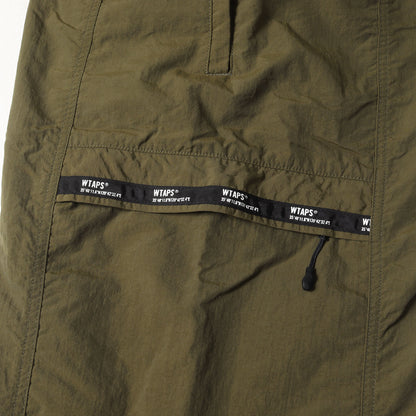 22AW ロゴテープ付き トラックパンツ(TRACKS / TROUSERS / NYLON. TUSSAH)