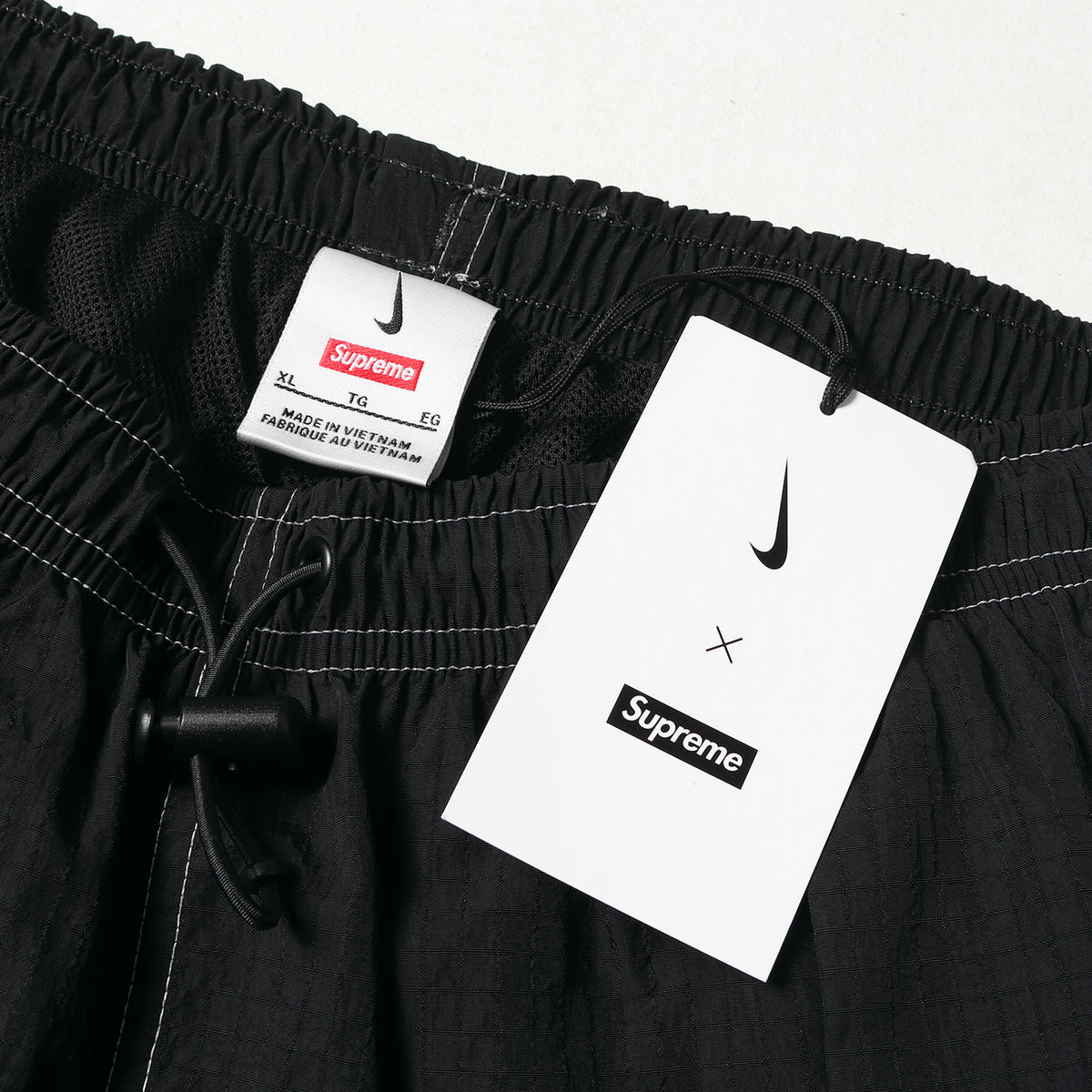 24SS ×NIKE スウッシュロゴ リップストップ トラックパンツ(Ripstop Track Pant)
