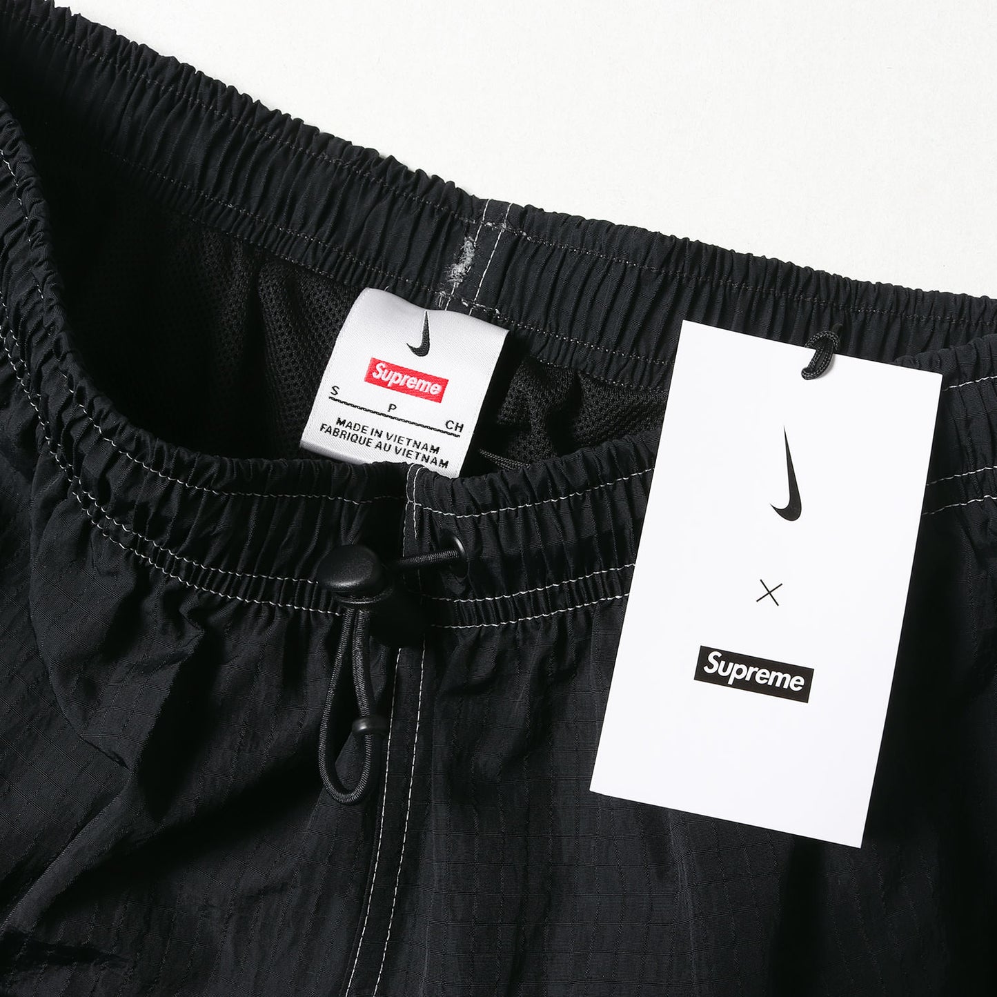 24SS ×NIKE スウッシュロゴ リップストップ トラックパンツ(Ripstop Track Pant)