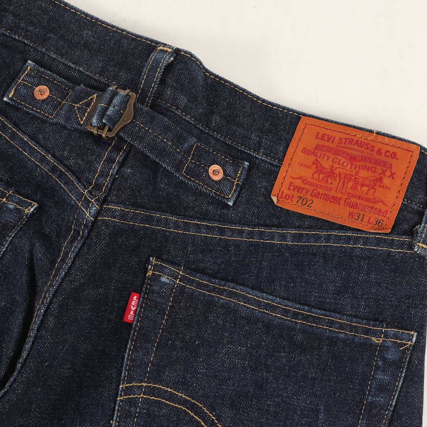 90s 702-XX シンチバック付き デニムパンツ(日本製)