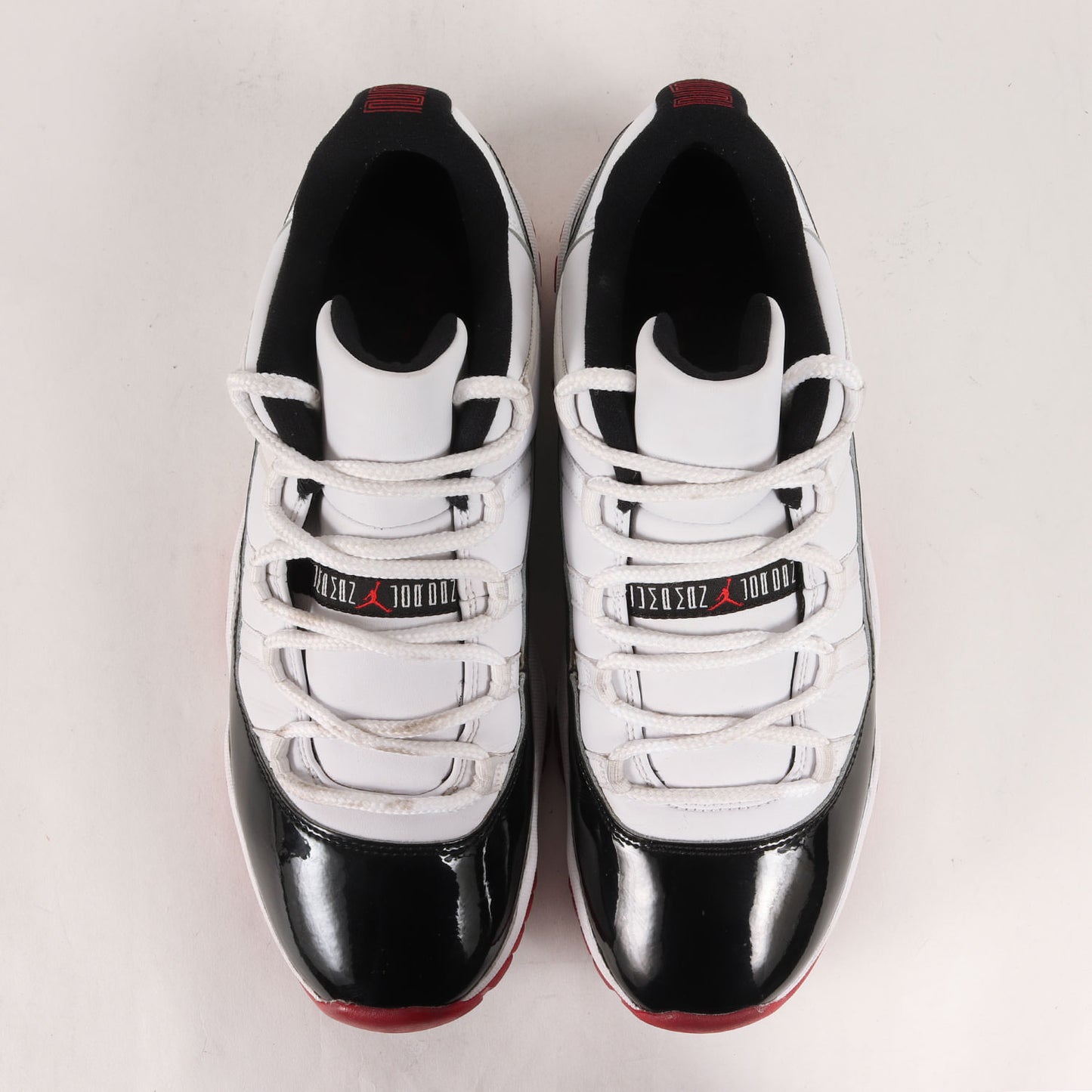 AIR JORDAN 11 RETRO LOW WHITE BRED (AV2187-160)