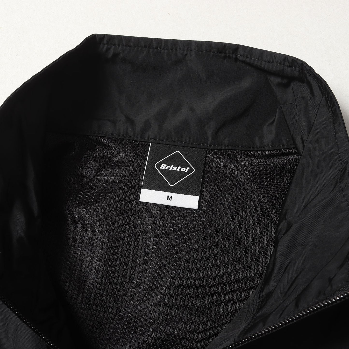 25SS スタンドカラー ナイロン ジャケット(STAND COLLAR PRACTICE JACKET)