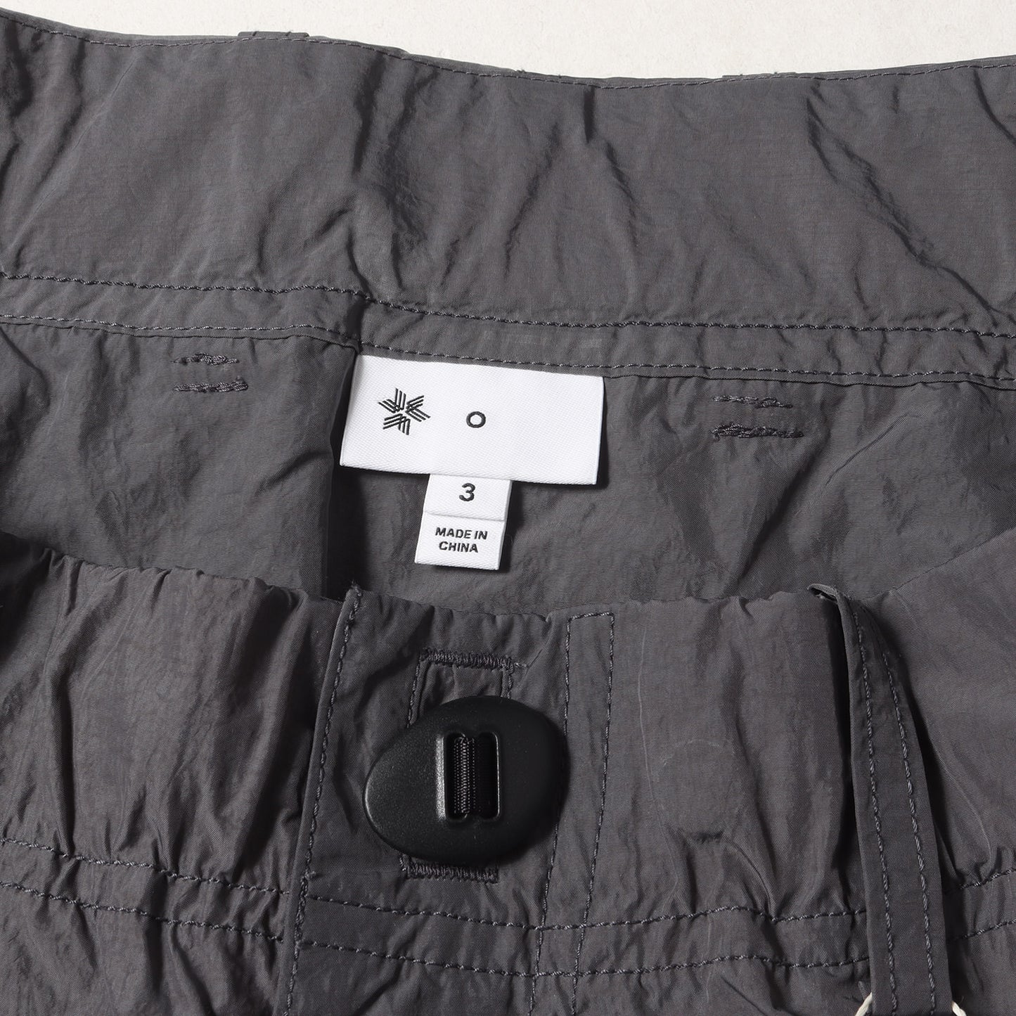 25SS Goldwin 0 ヘリコイド ナイロン ワイド カーゴパンツ(Helicoid Cargo Pants)