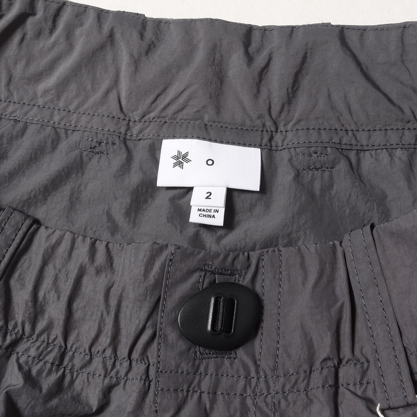 25SS Goldwin 0 ヘリコイド ナイロン ワイド カーゴパンツ(Helicoid Cargo Pants)