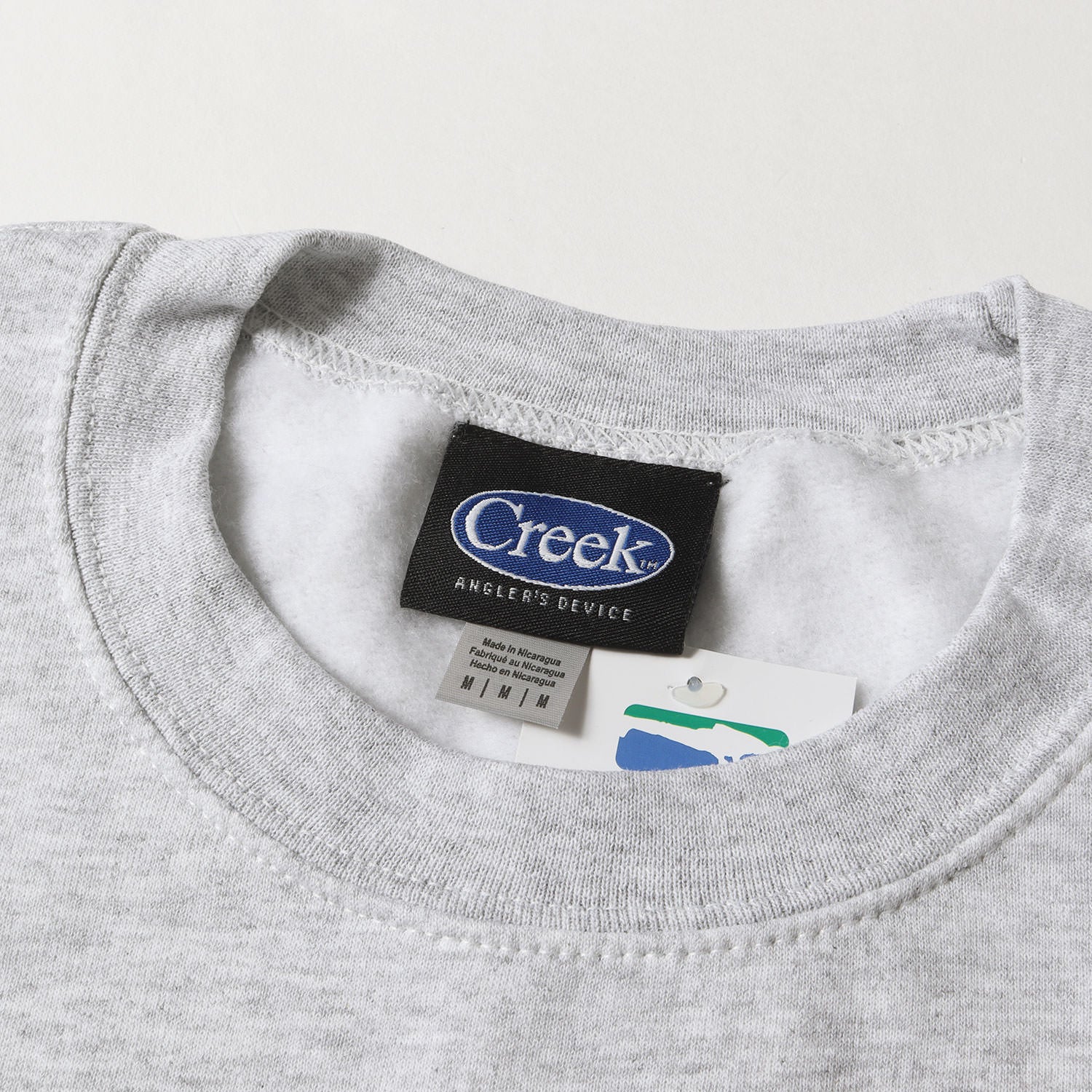 Creek angler's device クルーネックスウェット