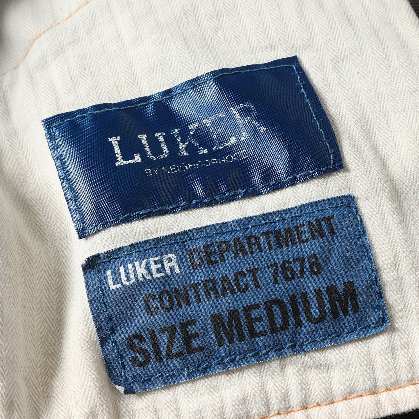 ×Levi's ロゴプリント テーパード デニムパンツ