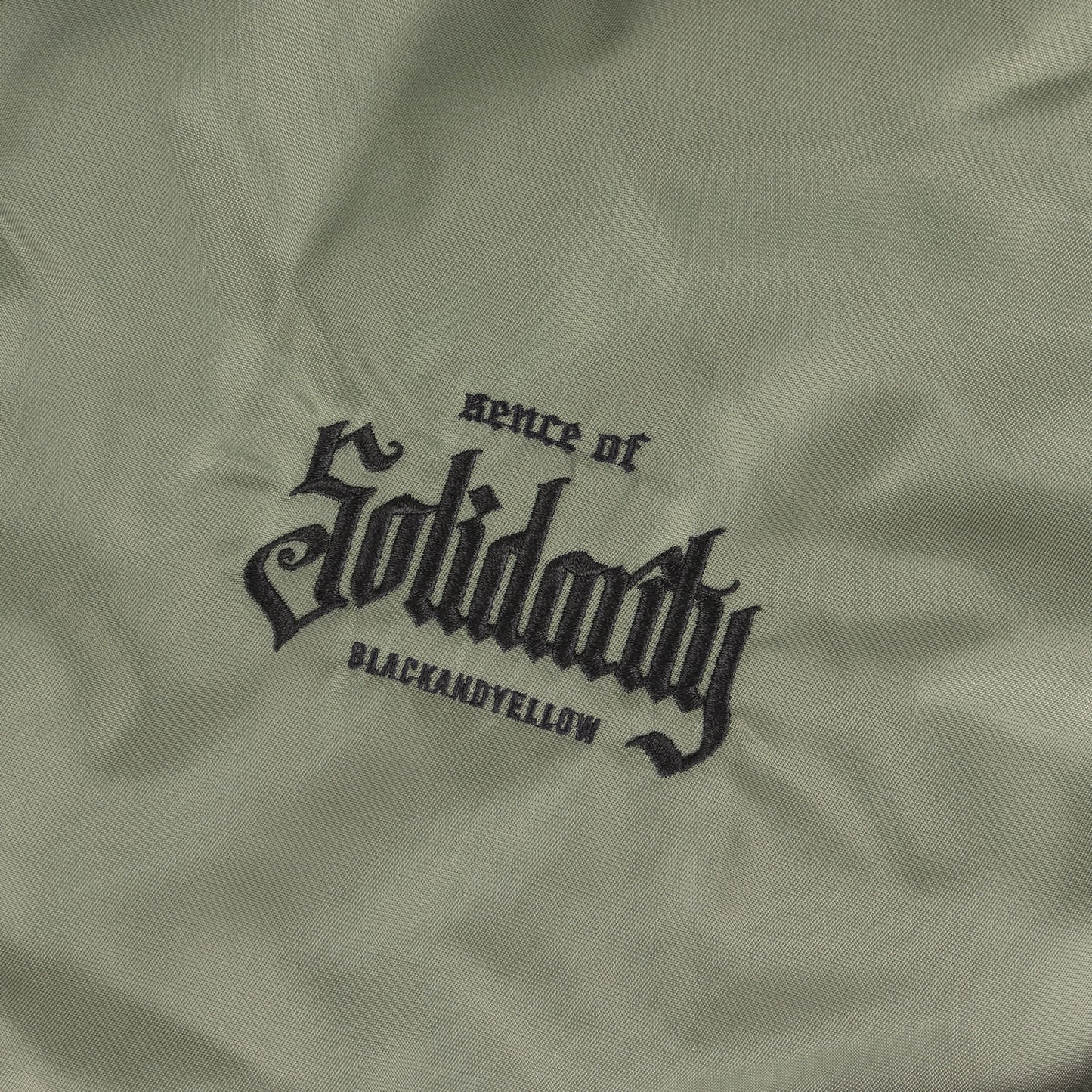23SS ロゴ刺繍 裏ボア コーチジャケット(BOA COACH JKT SOLIDARITY)