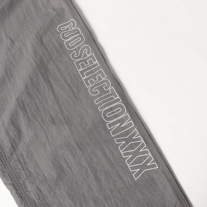 23SS ブランドロゴ ナイロン トラックパンツ(TRACK PANTS)