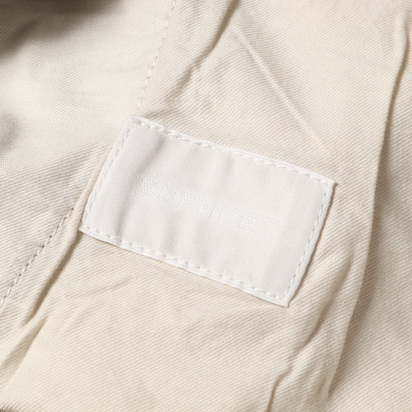 25SS ×SIMON TAYLOR グラフィック チノパンツ(LOGO CHINO PANTS)