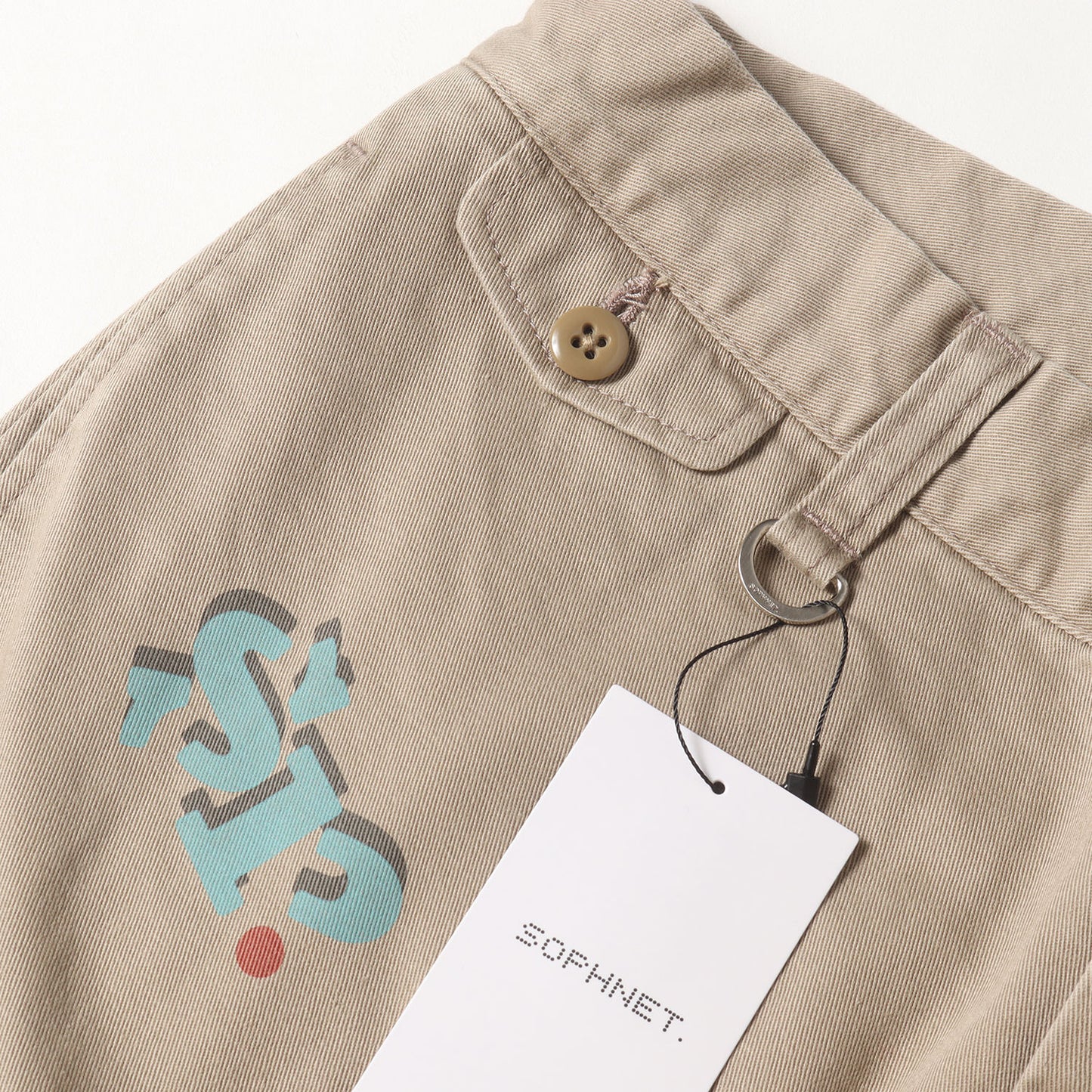25SS ×SIMON TAYLOR グラフィック チノパンツ(LOGO CHINO PANTS)