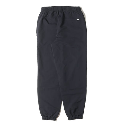 24AW ブランドロゴ刺繍 ナイロン トラックパンツ(SPST2002 /TROUSERS / NYLON. TUSSAH)