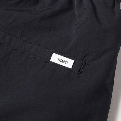 24AW ブランドロゴ刺繍 ナイロン トラックパンツ(SPST2002 /TROUSERS / NYLON. TUSSAH)