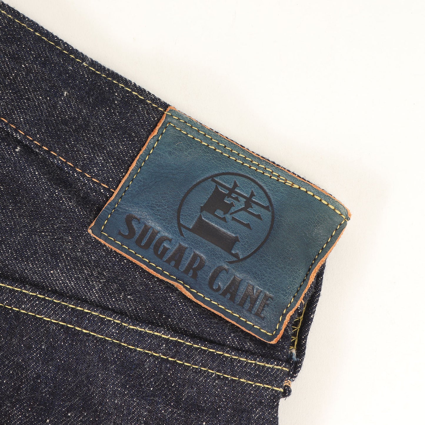 阿波藍混右綾 スリムテーパード デニムパンツ