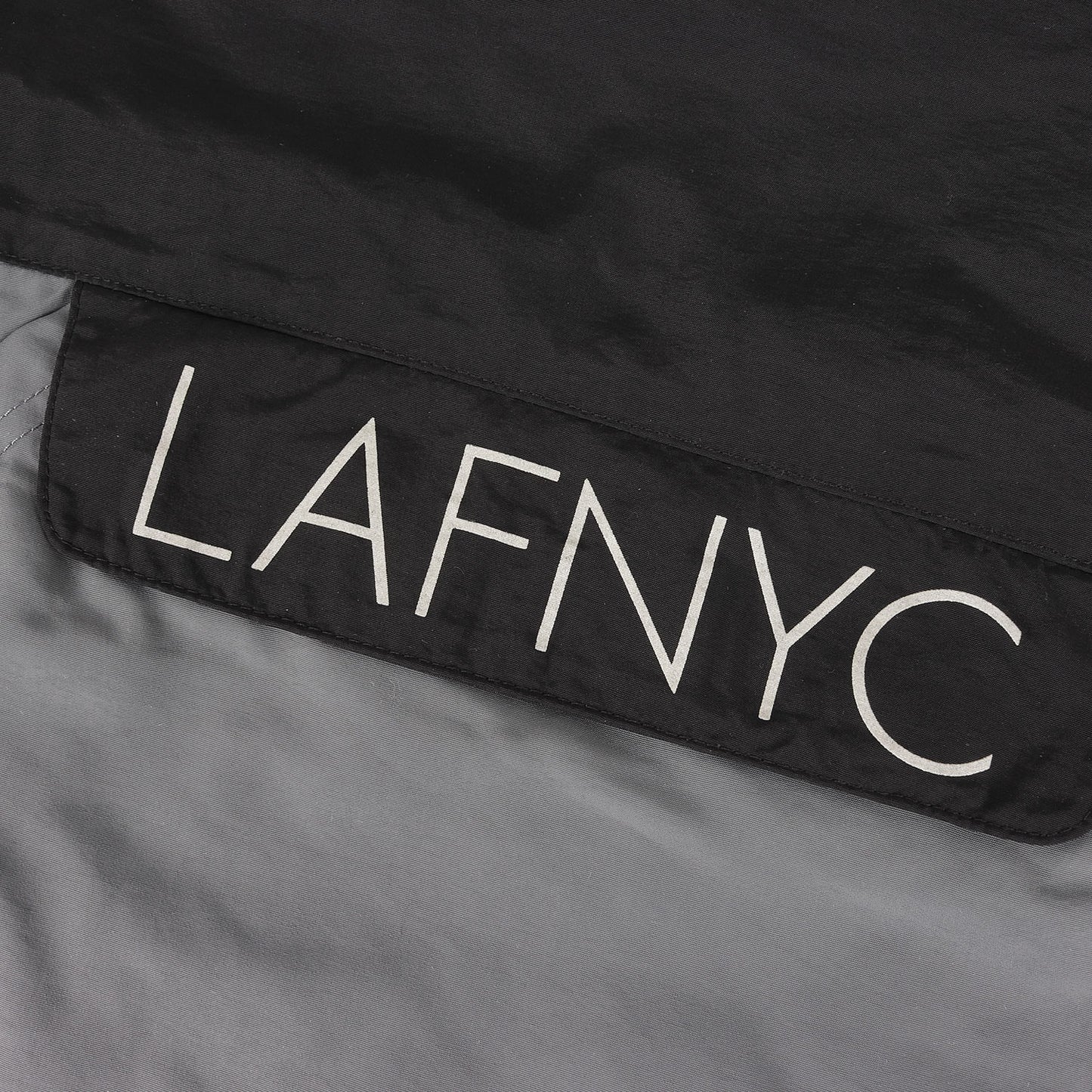 ハーフジップ ナイロン プルオーバージャケット