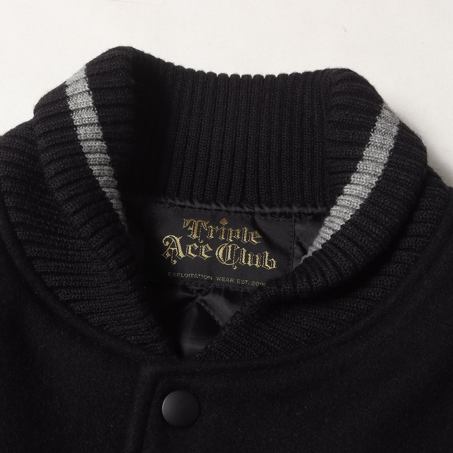 クロスロゴ 袖レザー メルトン スタジャン