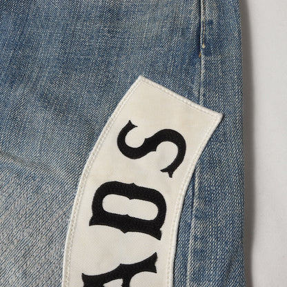 NOMADSパッチ付き ダメージ加工 デニムパンツ