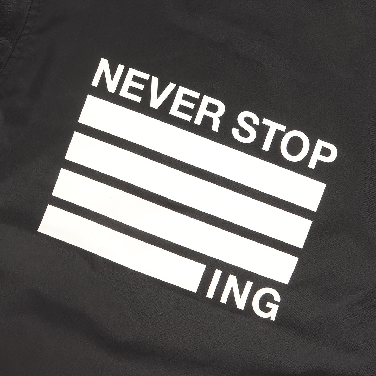 23AW ロゴプリント コーチジャケット(NEVER STOP ING The Coach Jacket)