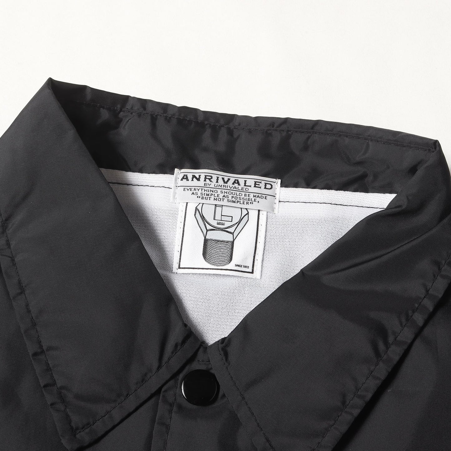 ×ANRIVALED by UNRIVALED スターパッチ ウィンドブレイカー / コーチジャケット(WINDBREAKER)