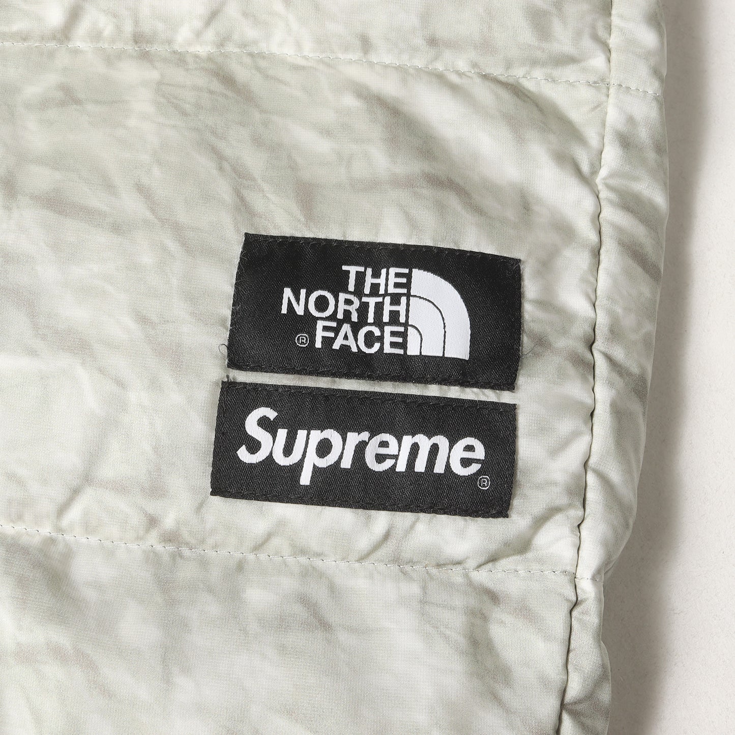 ×THE NORTH FACE ペーパープリント ヌプシ ダウンパンツ(Paper Print Nuptse Pant)