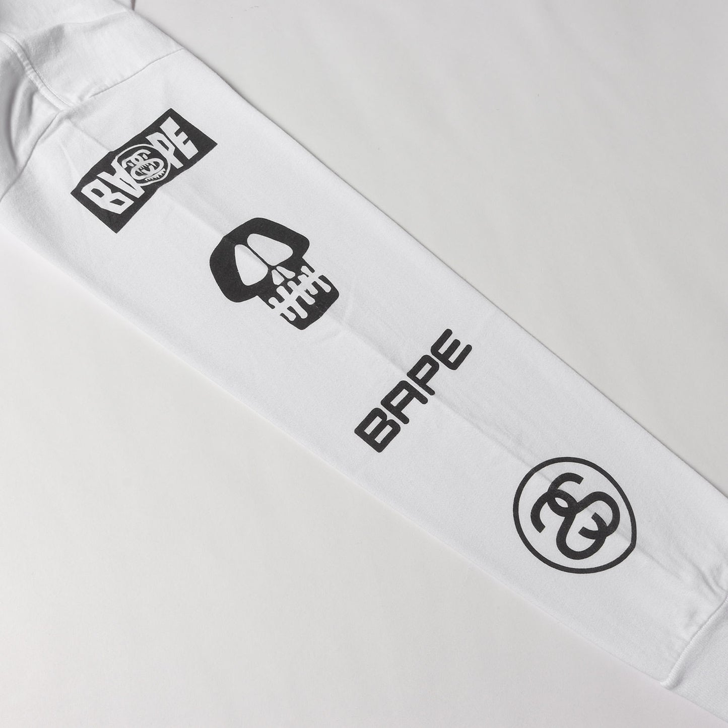 ×A BATHING APE マルチグラフィック ロングスリーブ Tシャツ