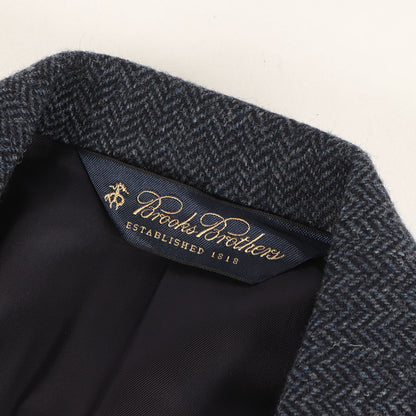 ヘリンボーンウール くるみボタン テーラードジャケット