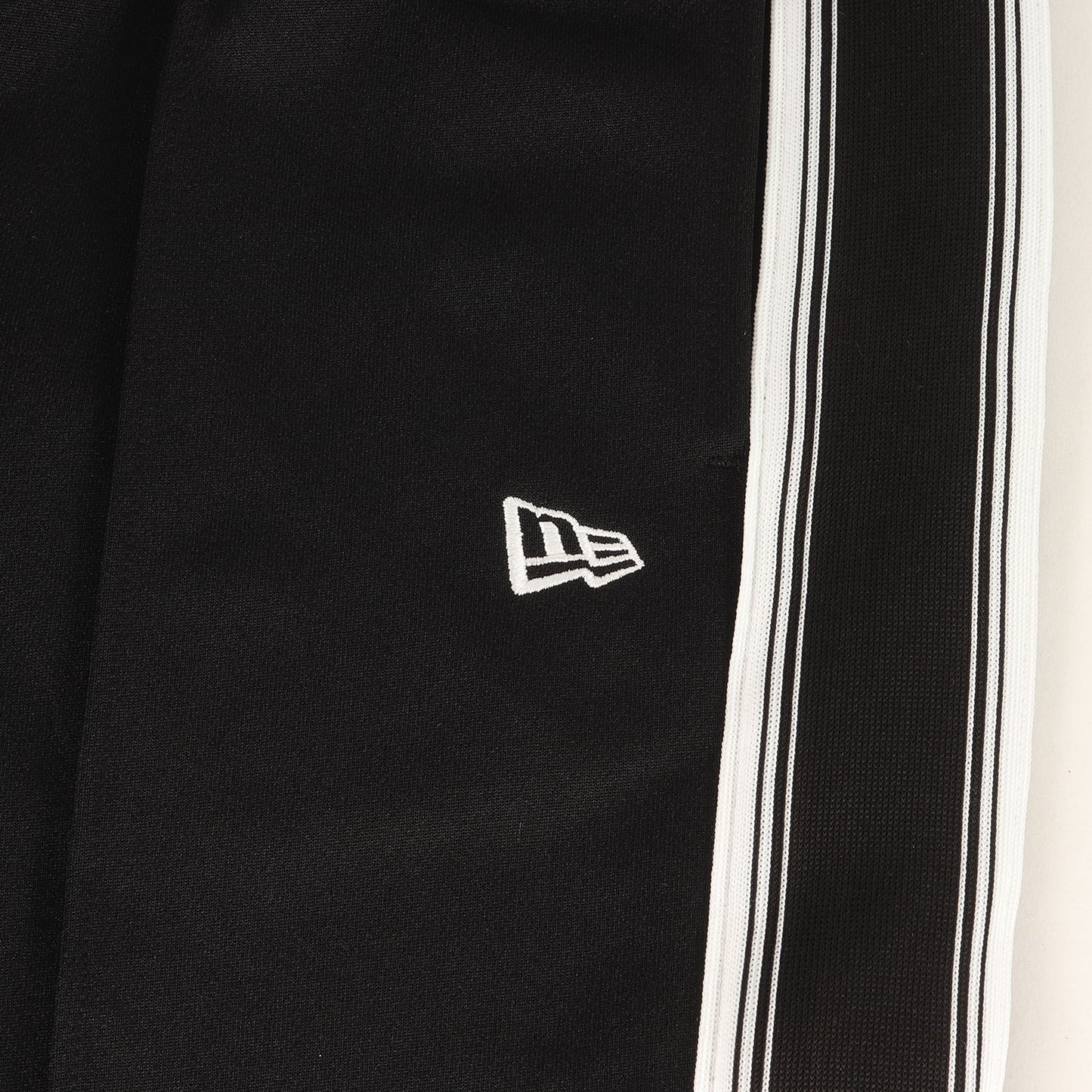 25AW ×MASTERMIND WORLD サイドテープ ジャージ トラックパンツ