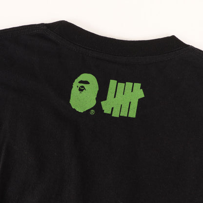 ×UNDEFEATED ABCカモ ロゴマーク Tシャツ