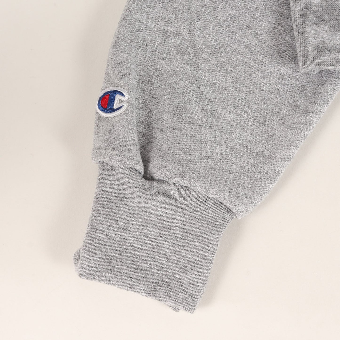 ×Champion フロッキープリント スウェットパーカー