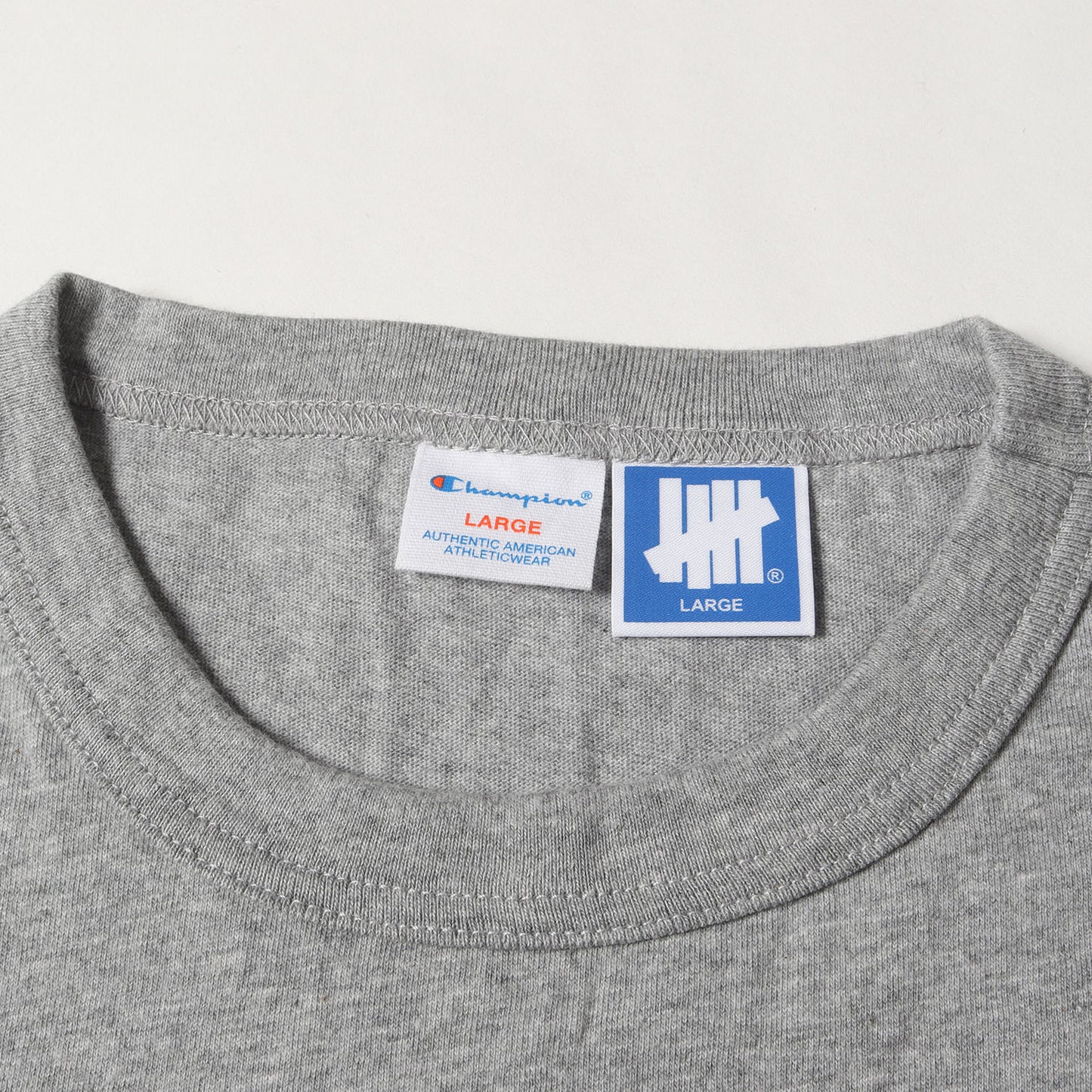×Champion ロゴプリント ロングスリーブ Tシャツ