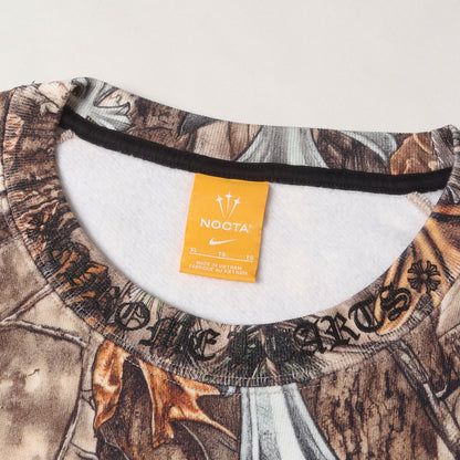 26SS × NIKE / DRAKE / NOCTA マルチモチーフ リアルツリーカモ クルーネック スウェット (Crewneck Sweatshirt Multi)