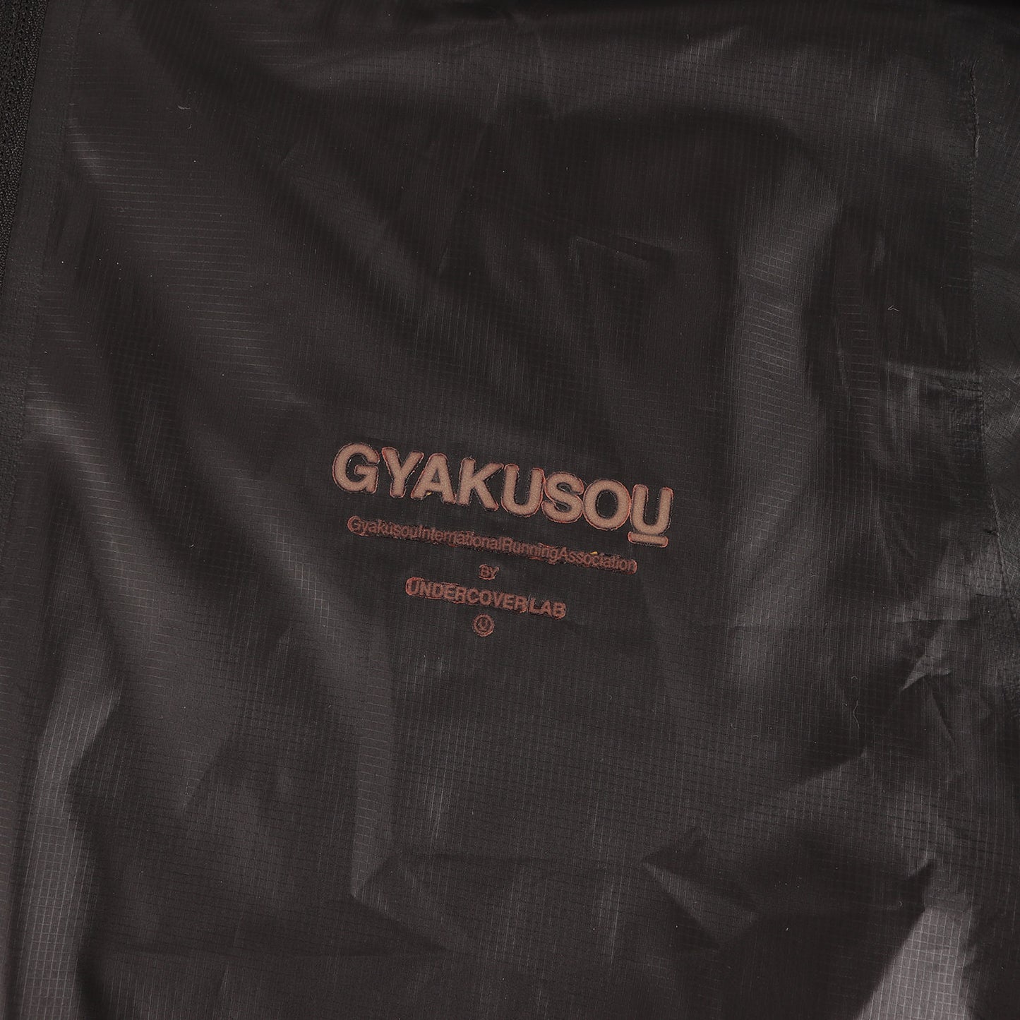 ×NIKE GYAKUSOU GIZAプリント パッカブル ライトウェイト ジャケット
